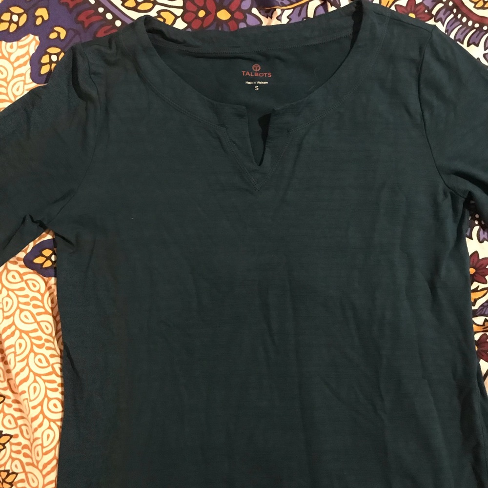 Quarter length blouse.